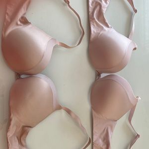 TWO VICTORIA’S SECRET LIGHTLY PADDED UNDERWIRE BRAS GENTLY WORN 34A